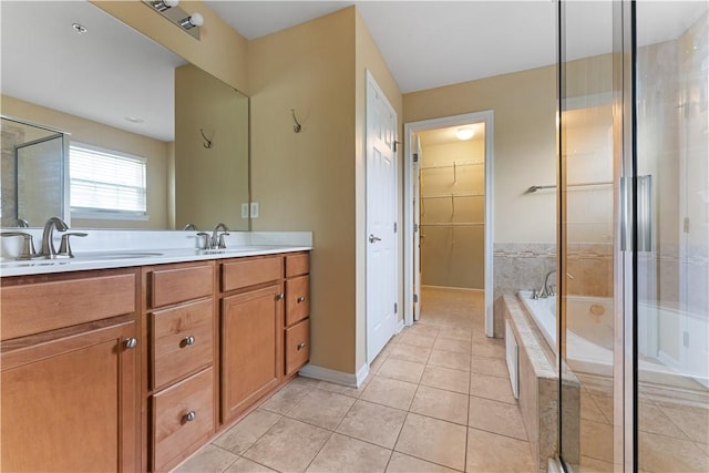 4015 Bentwood Dr, North Strabane, PA 15317 - full bathroom with tile patterned floors, double vanity, a bath, a shower stall, and a walk in closet