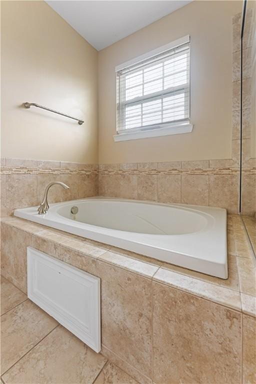 4015 Bentwood Dr, North Strabane, PA 15317 - bathroom with a garden tub and tile patterned flooring