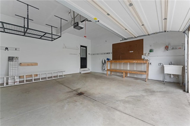 4015 Bentwood Dr, North Strabane, PA 15317 - garage featuring a garage door opener and a workshop area