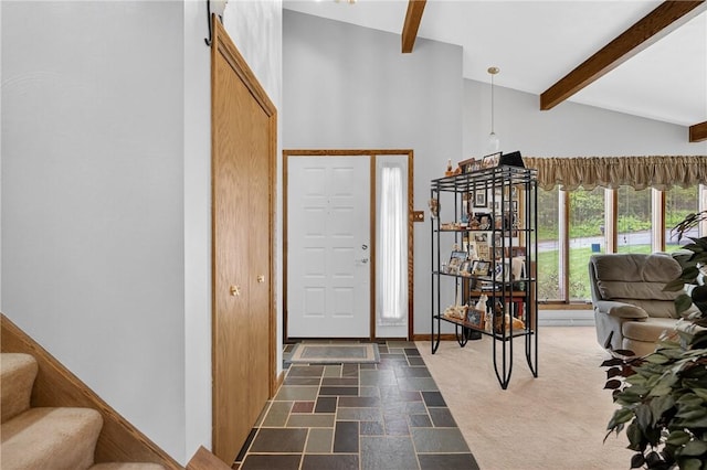 12169 Pine Crest Ct, North Huntingdon, PA 15085 - foyer with beamed ceiling, stone tile floors, stairway, and high vaulted ceiling