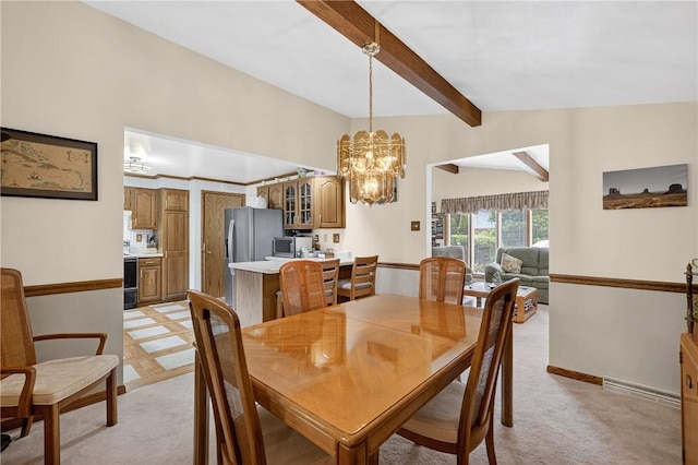 12169 Pine Crest Ct, North Huntingdon, PA 15085 - dining area with a chandelier and light carpet