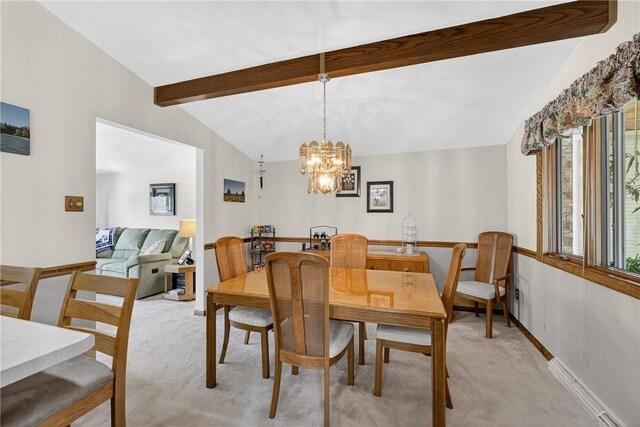 12169 Pine Crest Ct, North Huntingdon, PA 15085 - dining area featuring light colored carpet and a chandelier