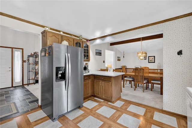 12169 Pine Crest Ct, North Huntingdon, PA 15085 - kitchen featuring stainless steel fridge, a peninsula, crown molding, light countertops, and glass insert cabinets