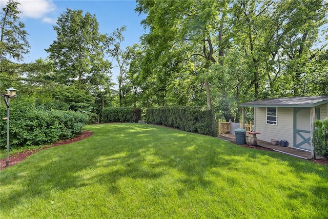 12169 Pine Crest Ct, North Huntingdon, PA 15085 - view of grassy yard featuring a storage unit