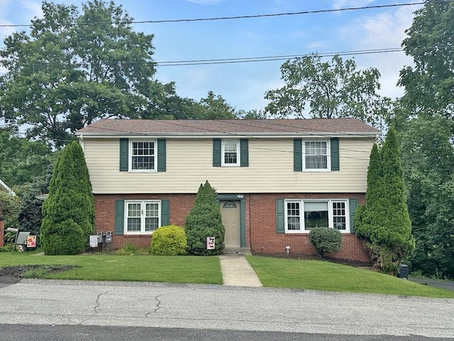 217 S Shady Ave, Chartiers, PA 15342 - colonial house featuring brick siding and a front yard