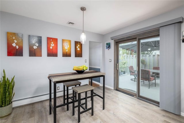 537 Center Church Rd, Peters Twp, PA 15317 - dining space featuring light wood-style floors and baseboard heating