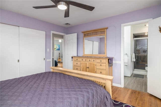 537 Center Church Rd, Peters Twp, PA 15317 - bedroom featuring light wood-style flooring, connected bathroom, a ceiling fan, and a closet