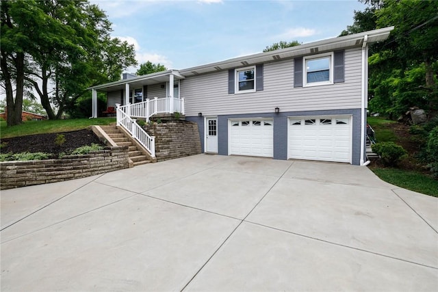 537 Center Church Rd, Peters Twp, PA 15317 - single story home with a garage, concrete driveway, a porch, and stairway