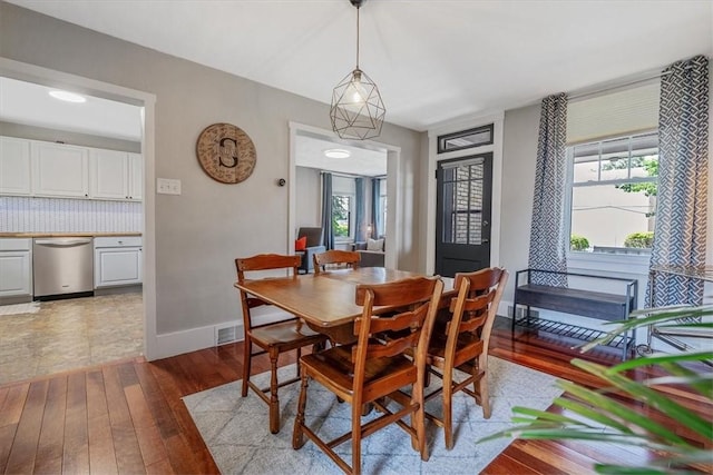 2125 Vodeli St, Beechview, PA 15216 - dining room featuring wood-type flooring and plenty of natural light