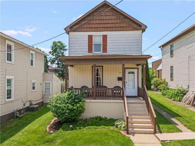 25 Iron St, Canonsburg, PA 15317 - view of front of property with covered porch and a front lawn