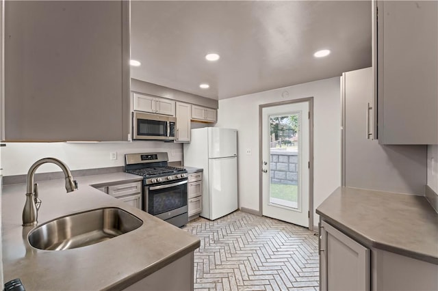 25 Iron St, Canonsburg, PA 15317 - kitchen featuring appliances with stainless steel finishes, recessed lighting, and brick patterned flooring