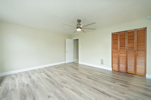 224 Mellon Ave, Donora, PA 15033 - unfurnished bedroom with light wood-style floors, a closet, and ceiling fan