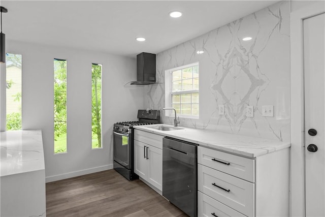 2513 Grove Rd, South Park, PA 15129 - kitchen featuring dishwashing machine, range with gas cooktop, wall chimney exhaust hood, recessed lighting, and white cabinetry