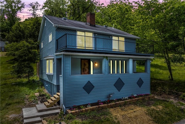 2513 Grove Rd, South Park, PA 15129 - rear view of property featuring a balcony and a chimney