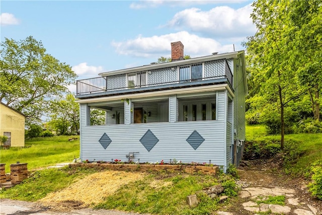 2513 Grove Rd, South Park, PA 15129 - view of front of property with a balcony and a chimney