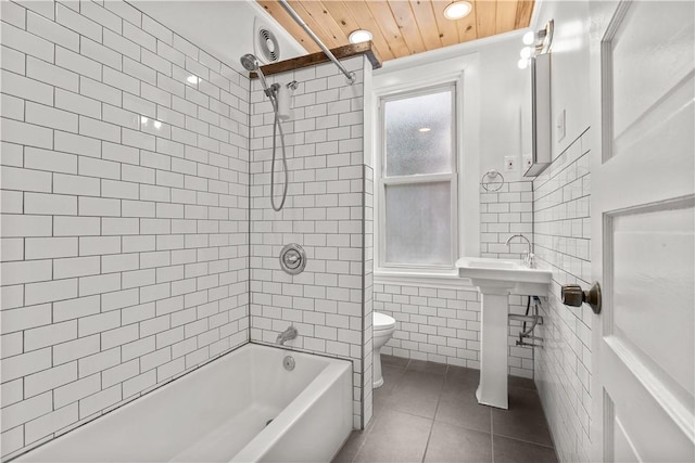 841 Stanton Ave, Millvale, PA 15209 - bathroom with tile walls,  shower combination, wooden ceiling, tile patterned flooring, and recessed lighting