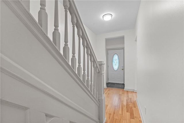 841 Stanton Ave, Millvale, PA 15209 - foyer with stairs and light wood-style floors