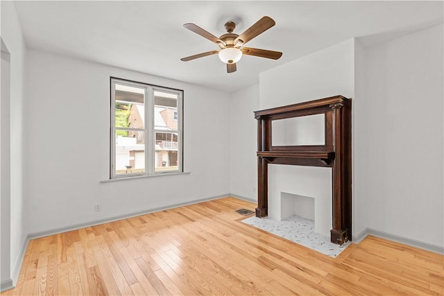 841 Stanton Ave, Millvale, PA 15209 - unfurnished living room with hardwood / wood-style floors and a ceiling fan