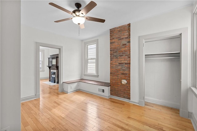 841 Stanton Ave, Millvale, PA 15209 - unfurnished bedroom with light wood-style flooring, a closet, and ceiling fan