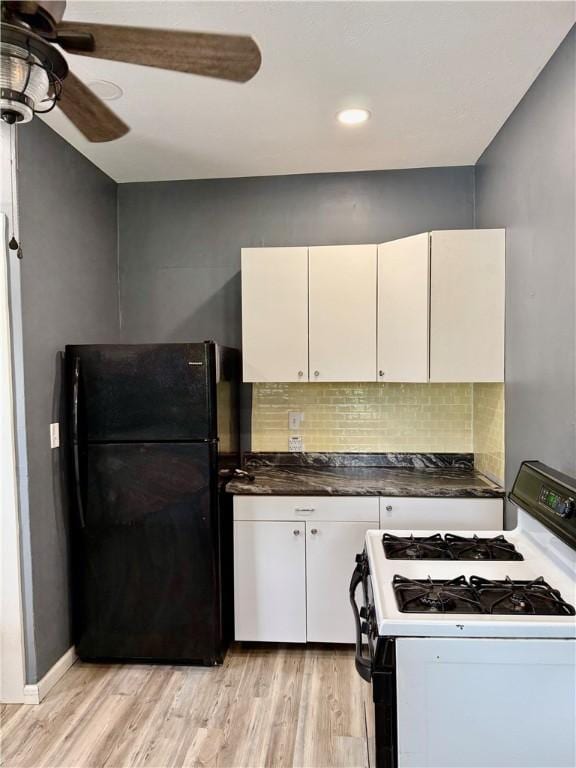 91 Wick Ave, Hermitage, PA 16148 - kitchen featuring white range with gas stovetop, freestanding refrigerator, ceiling fan, light wood finished floors, and recessed lighting
