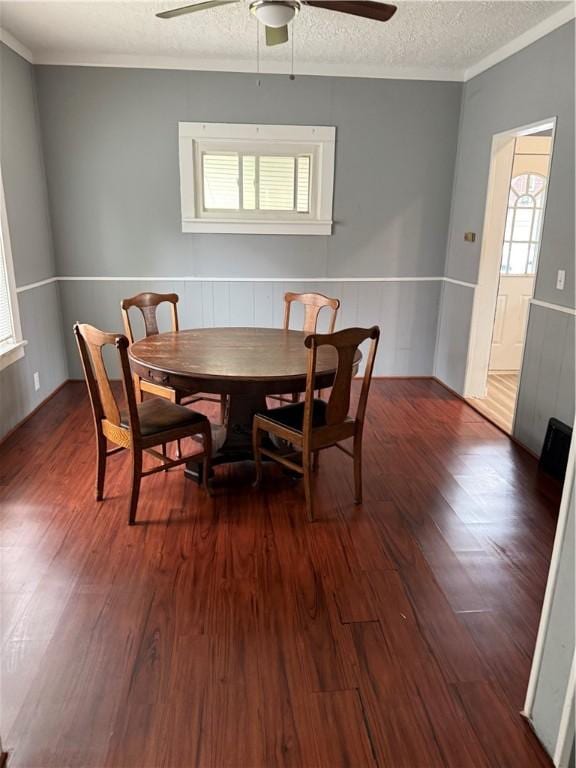 91 Wick Ave, Hermitage, PA 16148 - dining space featuring ceiling fan, wood finished floors, crown molding, a textured ceiling, and a wainscoted wall