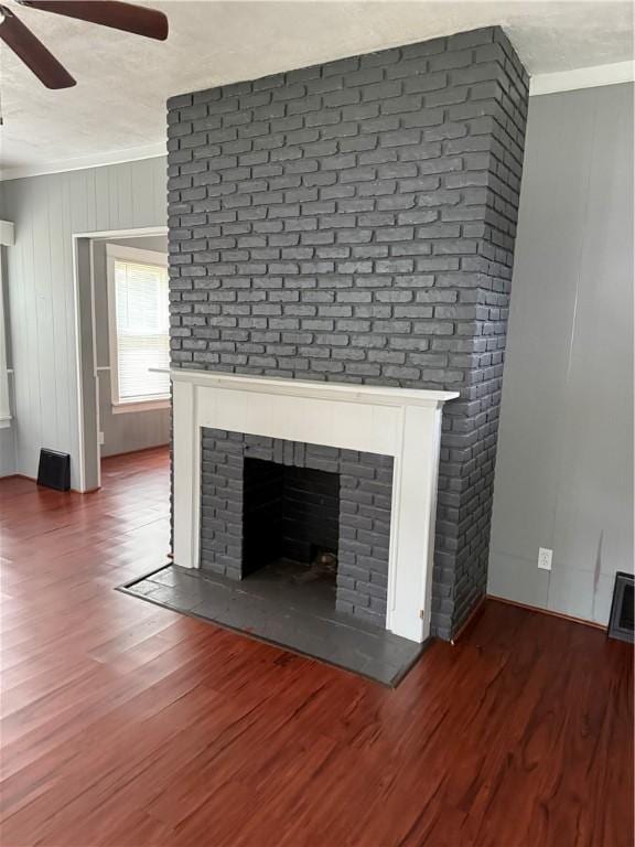 91 Wick Ave, Hermitage, PA 16148 - detailed view of a brick fireplace, a ceiling fan, wood finished floors, and ornamental molding