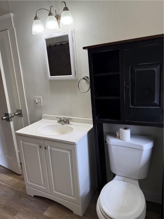 91 Wick Ave, Hermitage, PA 16148 - bathroom featuring vanity and wood finished floors