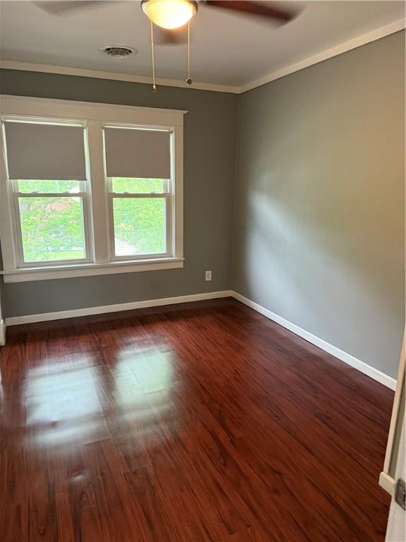 91 Wick Ave, Hermitage, PA 16148 - unfurnished room featuring ornamental molding, dark wood-type flooring, and ceiling fan