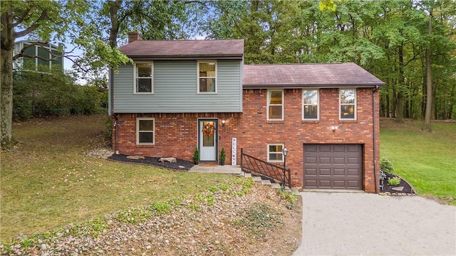 524 Sandy Hill Rd, Manor, PA 15642 - split level home with dirt driveway, a garage, a front lawn, and brick siding