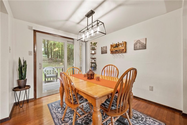 524 Sandy Hill Rd, Manor, PA 15642 - dining room featuring light wood-style floors and a chandelier