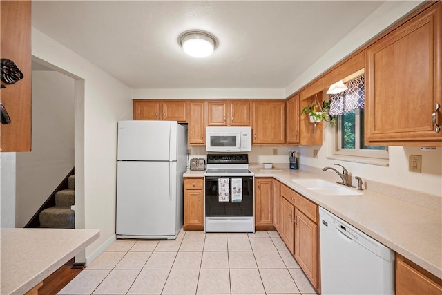 524 Sandy Hill Rd, Manor, PA 15642 - kitchen with white appliances, light countertops, light tile patterned floors, and brown cabinetry