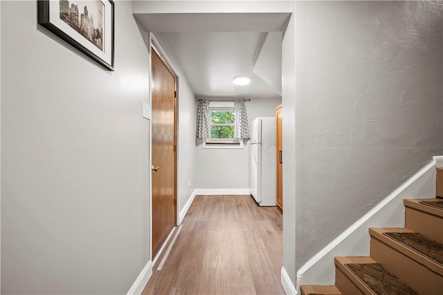 524 Sandy Hill Rd, Manor, PA 15642 - corridor featuring light wood finished floors and stairway