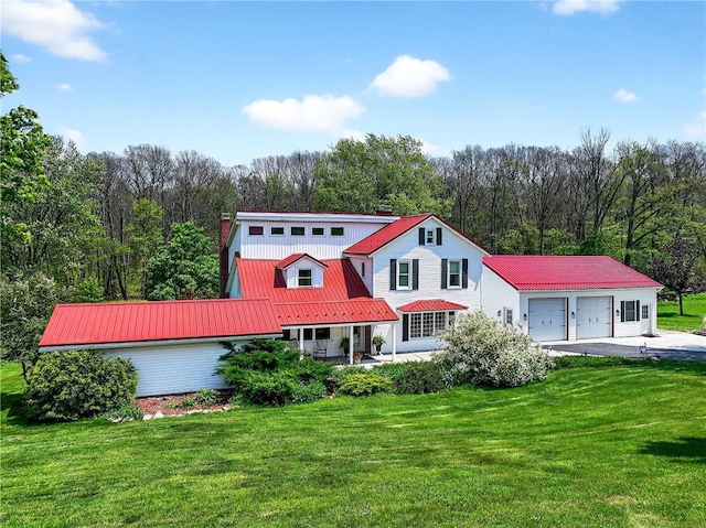 260 Stouffer Hill Rd, Somerset Twp, PA 15541 - view of front of property featuring a front lawn, a metal roof, and a wooded view
