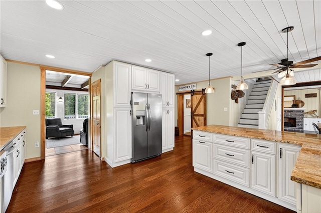 260 Stouffer Hill Rd, Somerset Twp, PA 15541 - kitchen featuring stainless steel refrigerator with ice dispenser, a barn door, dark wood-style flooring, wood ceiling, and white cabinets