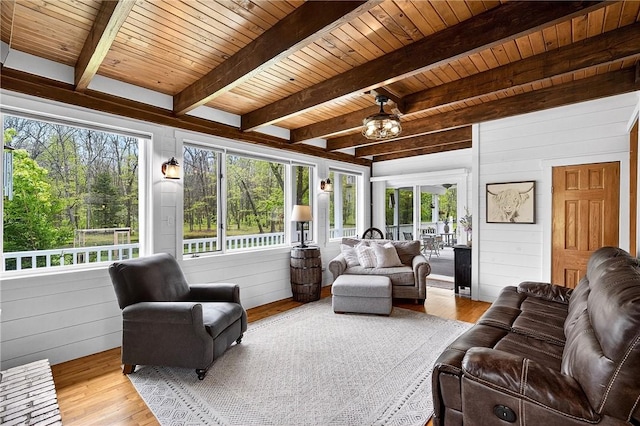 260 Stouffer Hill Rd, Somerset Twp, PA 15541 - sunroom featuring plenty of natural light, beam ceiling, and a chandelier