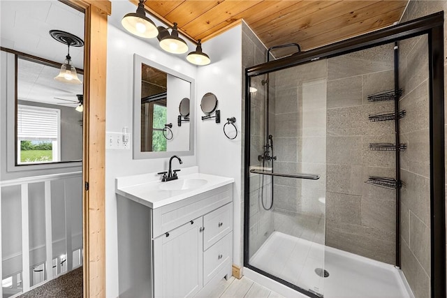 260 Stouffer Hill Rd, Somerset Twp, PA 15541 - full bathroom featuring a shower stall, vanity, ceiling fan, and wooden ceiling