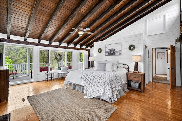 260 Stouffer Hill Rd, Somerset Twp, PA 15541 - bedroom featuring wooden ceiling, light wood-style flooring, and wooden walls