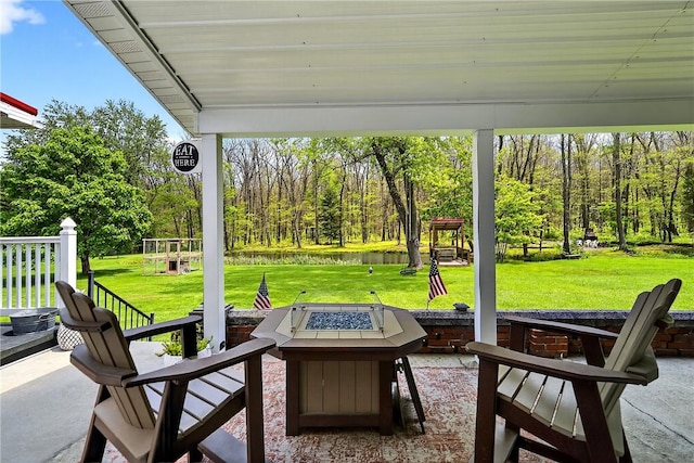 260 Stouffer Hill Rd, Somerset Twp, PA 15541 - view of patio / terrace featuring a fire pit and a water view