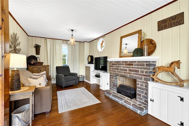 260 Stouffer Hill Rd, Somerset Twp, PA 15541 - living area featuring ornamental molding, a brick fireplace, and wood finished floors