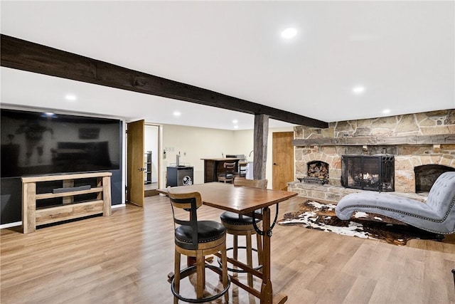 260 Stouffer Hill Rd, Somerset Twp, PA 15541 - dining room with a fireplace, wood finished floors, beam ceiling, and recessed lighting