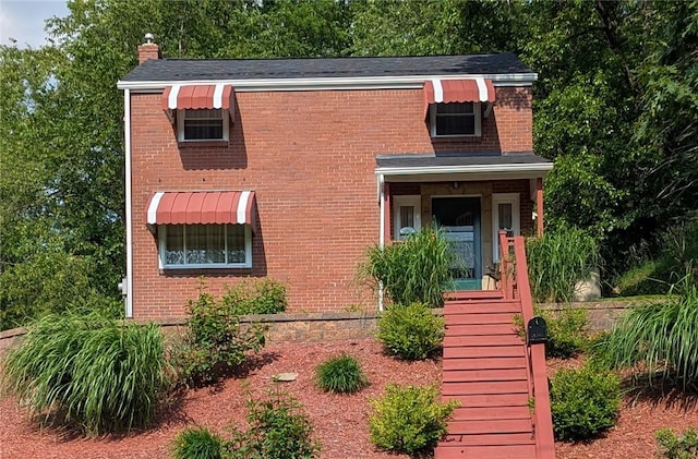 218 Bascom, Observatory Hill, PA 15214 - view of front of house featuring brick siding, a chimney, and stairs