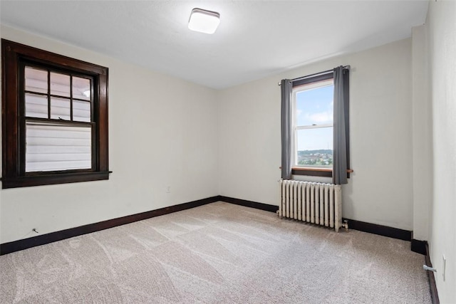 22 Beltzhoover Ave, Allentown, PA 15210 - unfurnished room with radiator and light carpet