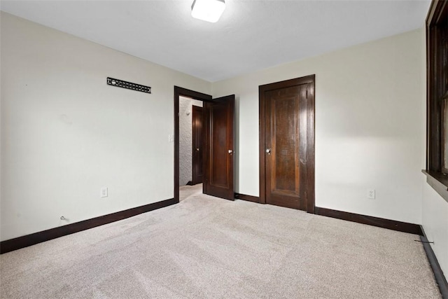 22 Beltzhoover Ave, Allentown, PA 15210 - unfurnished bedroom featuring carpet flooring and a closet