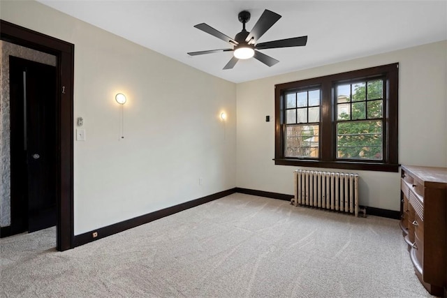 22 Beltzhoover Ave, Allentown, PA 15210 - unfurnished room featuring radiator heating unit, light carpet, and a ceiling fan