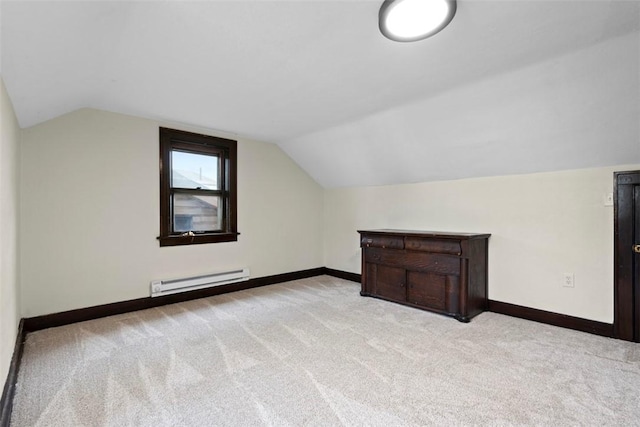 22 Beltzhoover Ave, Allentown, PA 15210 - additional living space with baseboard heating, carpet floors, and vaulted ceiling
