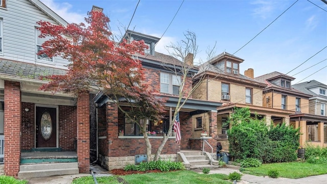 22 Beltzhoover Ave, Allentown, PA 15210 - american foursquare style home with a porch and brick siding