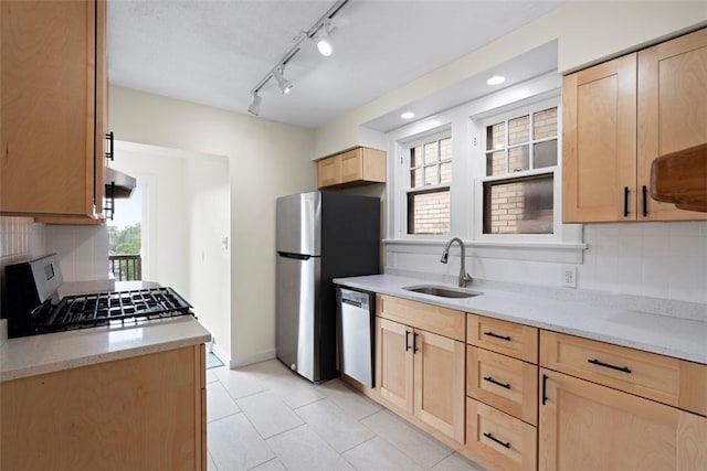 22 Beltzhoover Ave, Allentown, PA 15210 - kitchen with stainless steel appliances, light brown cabinets, decorative backsplash, extractor fan, and recessed lighting