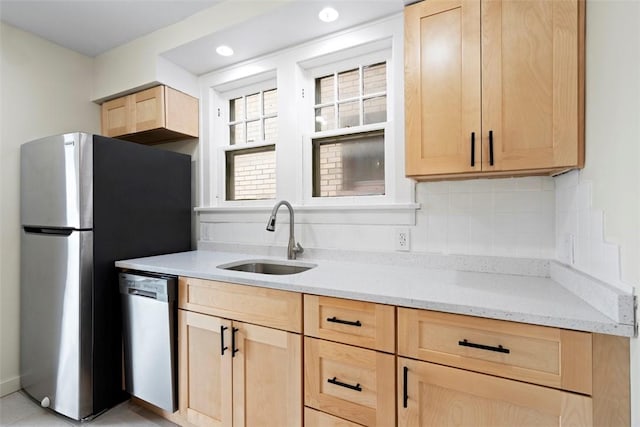 22 Beltzhoover Ave, Allentown, PA 15210 - kitchen with light brown cabinetry, stainless steel appliances, light stone counters, and recessed lighting