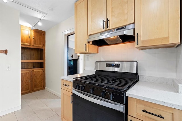 22 Beltzhoover Ave, Allentown, PA 15210 - kitchen featuring stainless steel gas stove, under cabinet range hood, and light brown cabinetry