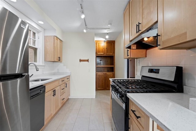 22 Beltzhoover Ave, Allentown, PA 15210 - kitchen featuring stainless steel appliances, under cabinet range hood, and decorative backsplash